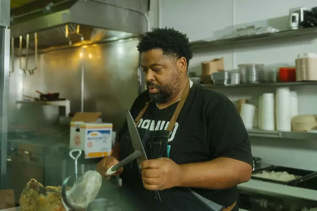 Chef and owner of Gumbo Social, Dontaye Ball